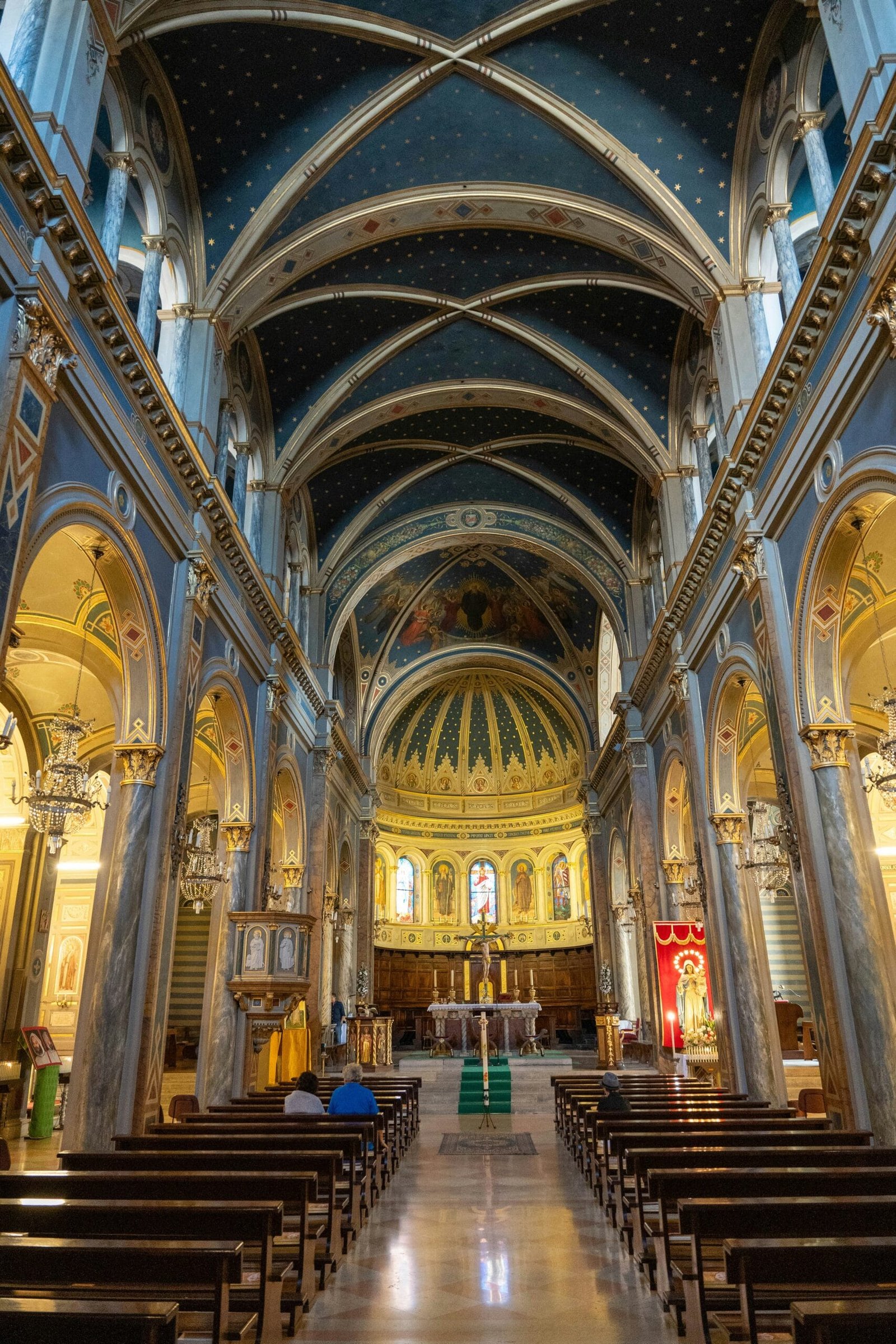 A church with pews and vaulted ceiling